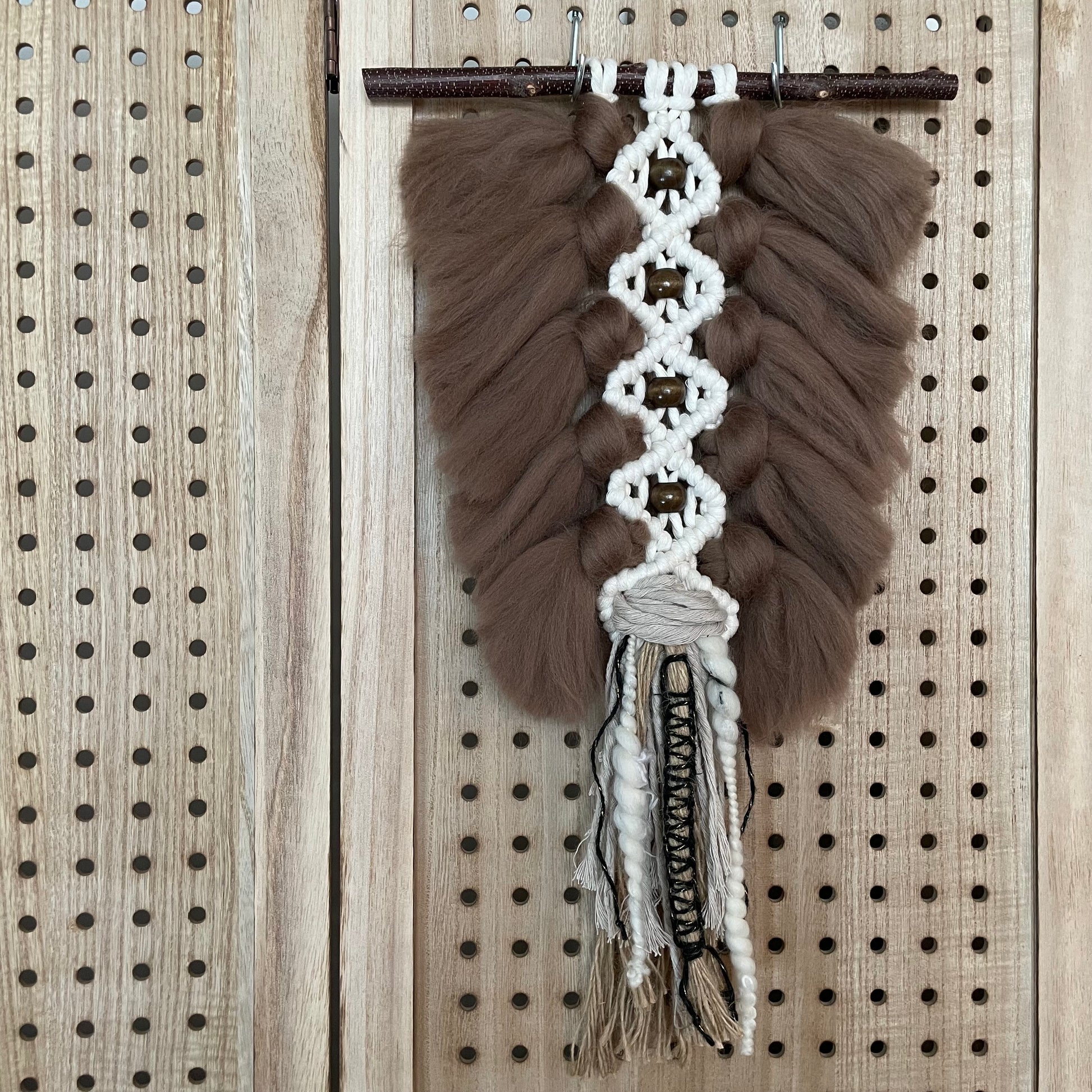 Plumage - Medium - Tobacco - on natural wood panel