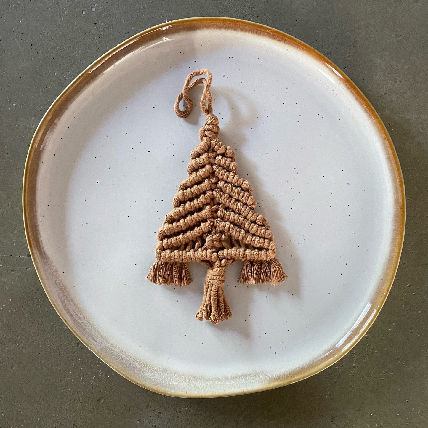 Caramel Tree Ornament centered on dinner plate