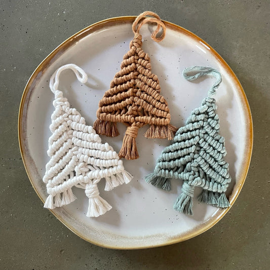 3 Tree Ornaments grouped on dinner plate